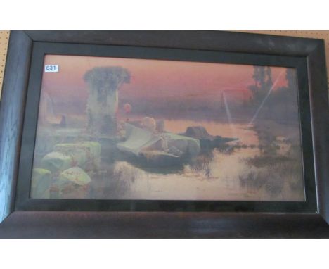 A large print sunset over river in oak frame