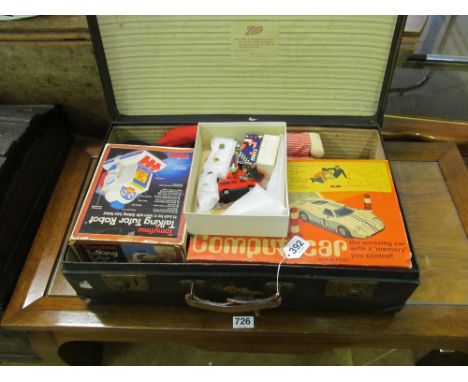 Three vintage games, telescope and Robertsons doll, badges etc