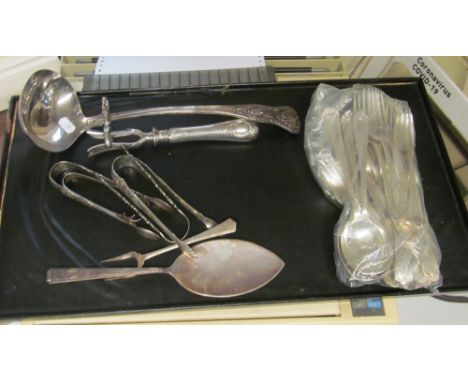 A plated ladle, joint holder, plated cutlery and five pairs tongs