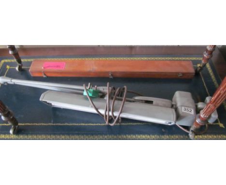 A guillotine, desk light and compasses Beam 26" instrument and a tripod stand