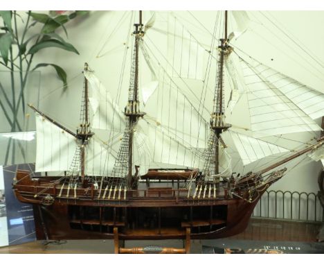 Scale model of HMS Bounty 1783 with scales and rigging in perspex display case, L: 98 cm. Not available for in-house P&amp;P 