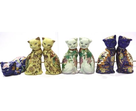 Seven Oriental ceramic cats, largest H: 20 cm, no chips or cracks. P&amp;P Group 3 (£25+VAT for the first lot and £5+VAT for 