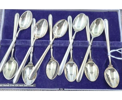 Eleven Carrington &amp; Co silver gilt spoons, hallmarked 1965, Birmingham assay, combined 112g. P&amp;P Group 1 (£14+VAT for