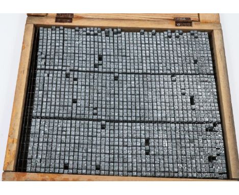 A 20th century Chinese Republic cased set of character stamps in die-cast metal, near-complete, with reference pages, contain