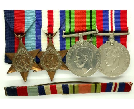 Four commemorative WWII medals and a ribbon bar. P&amp;P Group 1 (£14+VAT for the first lot and £1+VAT for subsequent lots) 