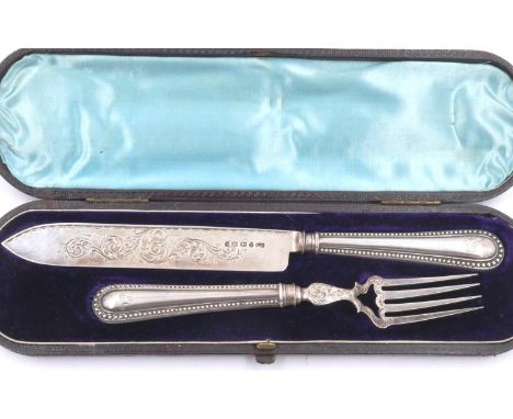 Cased hallmarked silver knife and fork set, Birmingham assay, 94g. P&amp;P Group 2 (£18+VAT for the first lot and £3+VAT for 