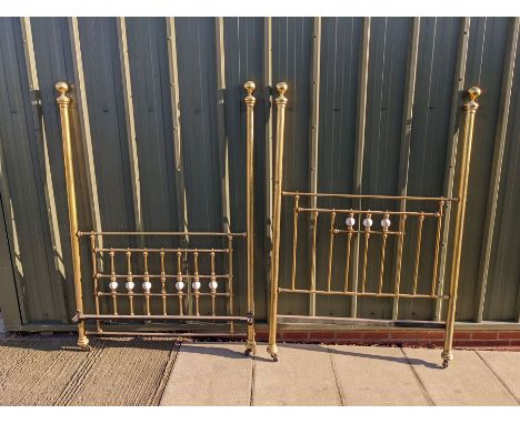 Brass effect head board and footboard with ceramic decorations 