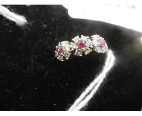 AN 18CT RUBY, DIAMOND TRIPLE CLUSTER RING