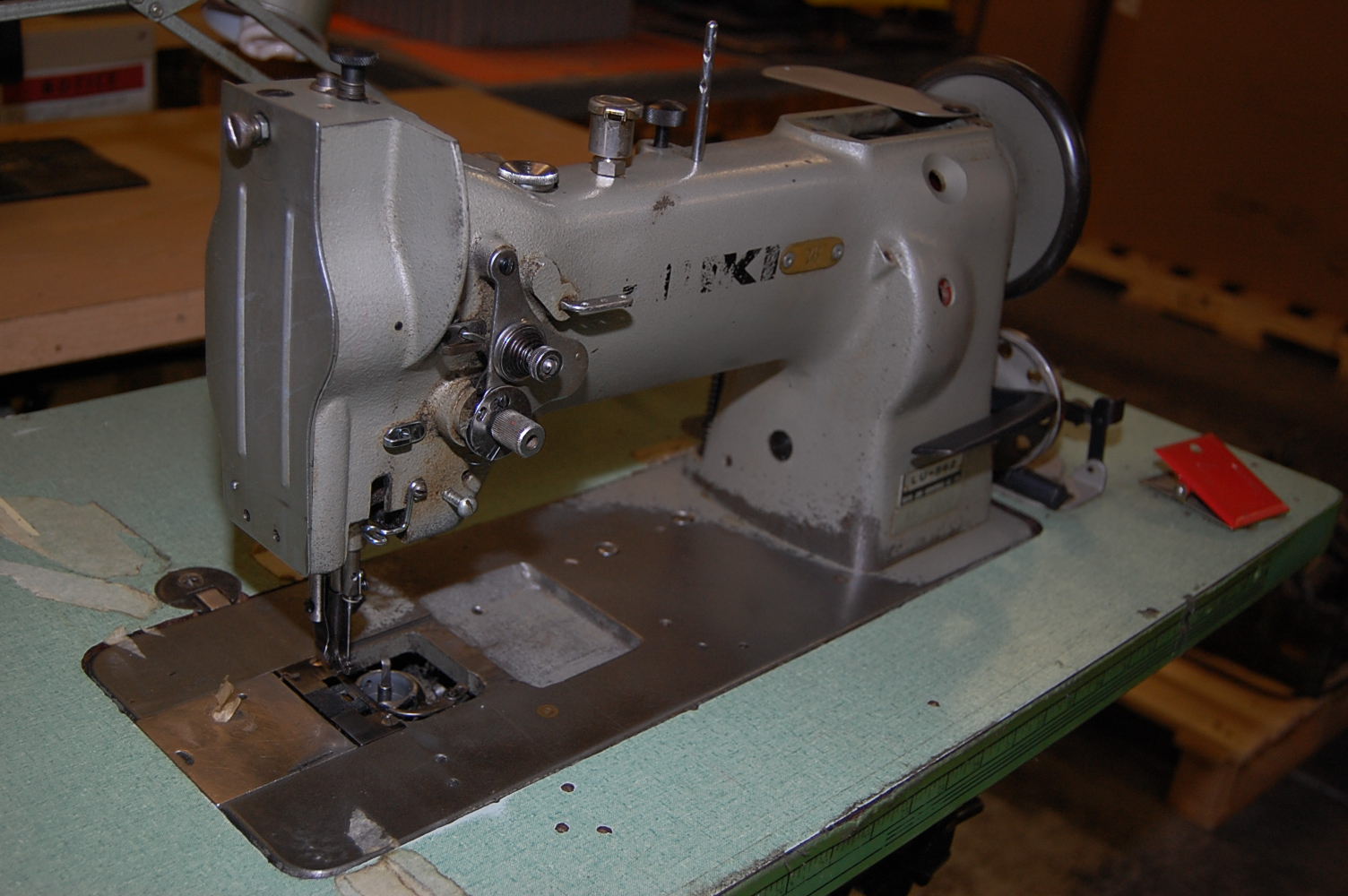 Juki Model LU562 Sewing Machine Mounted on Bench, Serial 456204323