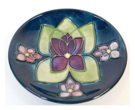 A floral Moorcroft pottery trinket dish, silver line 4.6in diameter