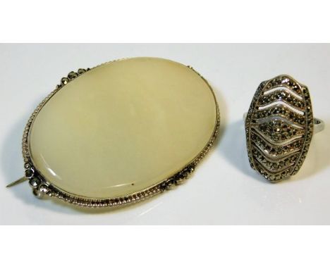 A 1930's white agate brooch twinned with a silver art deco marcasite ring size O/P, both with faults 24.5g 