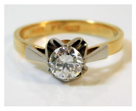 An 18ct gold ring set with a lively diamond of good clarity approx. 0.7ct 3.4g, size L 