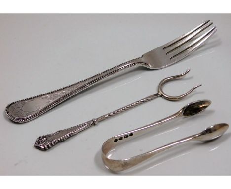 Three pieces of silverware: Pickle fork - Birmingham, T. H. Hazelwood &amp; Co. 1904 ; Fork - Sheffield, Martin Hall &amp; Co