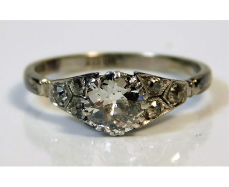 An antique 18ct white gold ring set with approx. 0.75ct old cut centre diamond (approx. 6mm x 4mm) of good colour &amp; clari