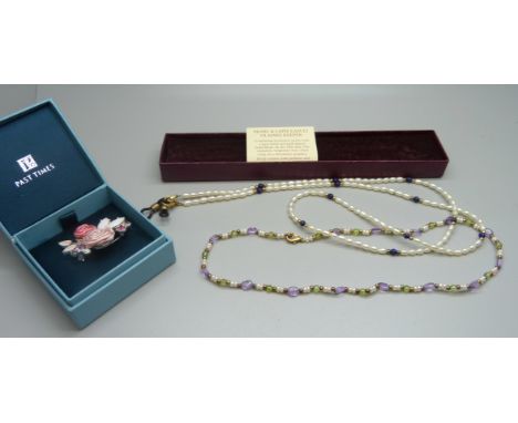 Past Times pearl and lapis lazuli glasses keeper, pearl and gemstone necklace and a brooch 