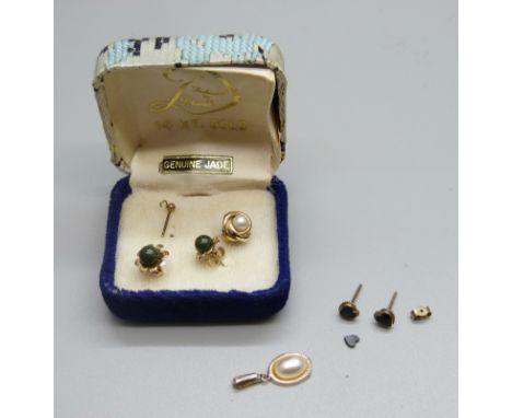 A pair of 14k gold and jade stud earrings, etc. 