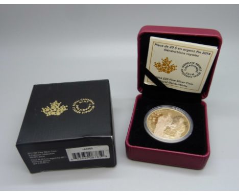 A Canadian 2014 silver gilt commemorative $20 coin, 31.39g of pure silver 