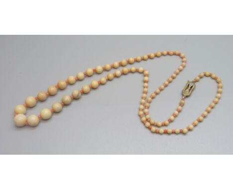 A coral necklace with silver gilt clasp 