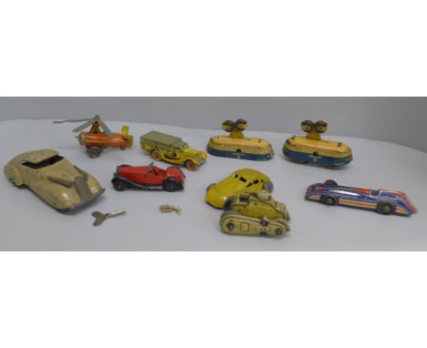 Eight tin-plate model vehicles including clockwork and a Dinky Toys classic car 