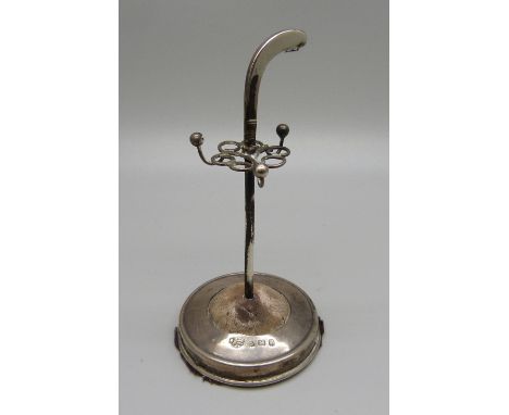 A novelty silver ring stand in the form of a hockey stick, Birmingham 1908 