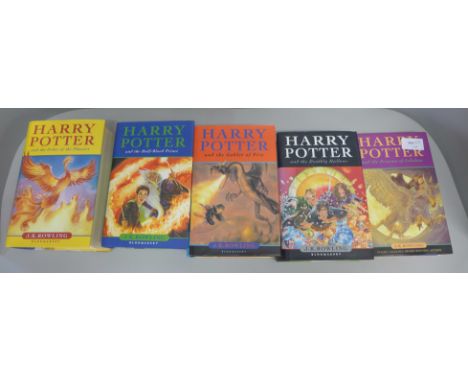 Four Harry Potter first edition books and an early edition Prisoner of Azkaban 