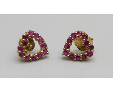 A pair of 9ct gold and ruby heart shaped earrings, 1.1g 