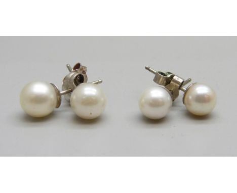 Two pairs of silver and cultured pearl stud earrings 