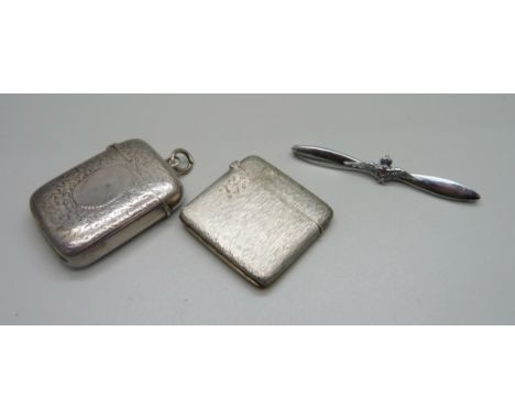 A silver vesta case, Birmingham 1894, George Unite, a continental 800 silver vesta case and a RAF sweetheart brooch 