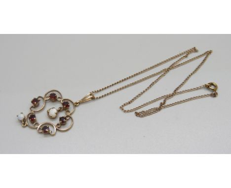 A 9ct gold, Art Nouveau style opal and garnet pendant and chain, 5.5g