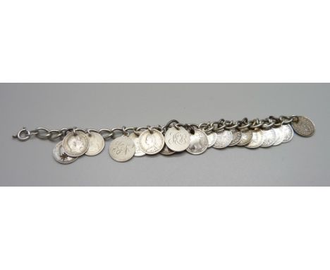 A silver nineteen coin bracelet, 34g 