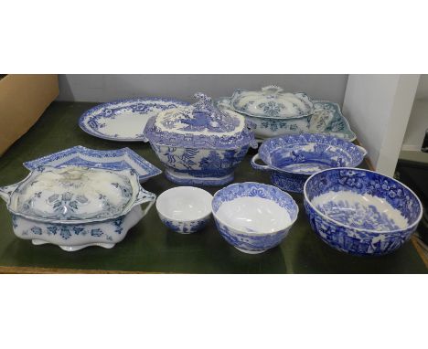 A box of blue and white china including Spode slop bowl, Wedgwood fruit bowl, Willow pattern vegetable dish and cover, two ot