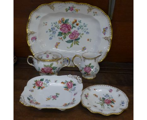 A Royal Crown Derby Days serving plate, one other plate, sugar basin with lid, cream jug and tea plate 