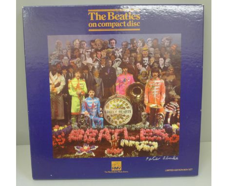 A Beatles related Peter Blake autographed Sgt. Pepper CD boxed set 