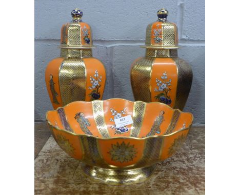 A Mason's Ashworth Chinoiserie Patent ironstone china fruit bowl and a pair of matching lidded jars, one jar with chip to the
