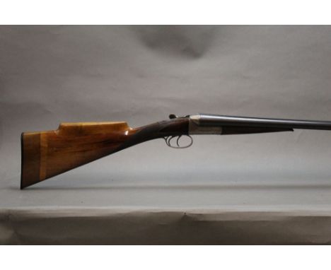 Robert Lisle of Derby a 12 bore side by side shotgun, with 30" barrels, cylinder and quarter choke, 2 1/2" chambers, the rib 