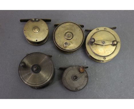 W R Pape Newcastle a brass 2 1/2" reel, together with four other brass and alloy reels.