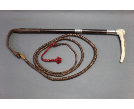 Swaine &amp; Adeney London, a gentleman's riding whip, having stag antler handle with inset Swaine &amp; Adeney button leadin