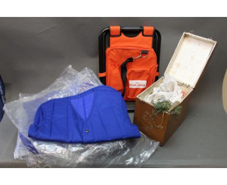 A ferret box with purse nets, together with a folding stool and five blue gilets Size S.
