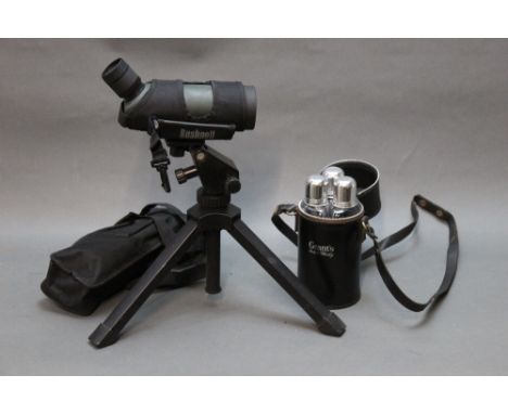 A Bushnell 16 x 52 spotting scope with tripod, together with a Grants Scotch Whiskey three sectioned flask.