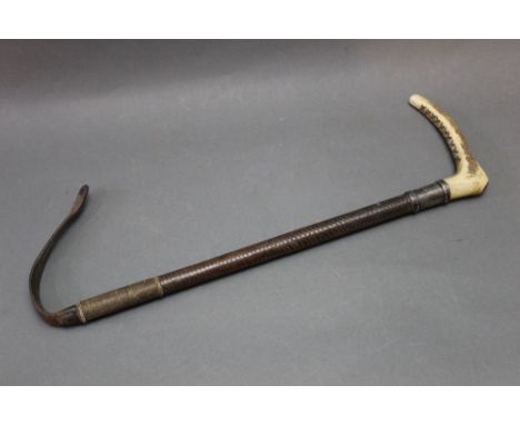 Swaine &amp; Adeney Ltd London, an antler handled riding crop with Swaine button and fitted with a silver collar marked WHC f