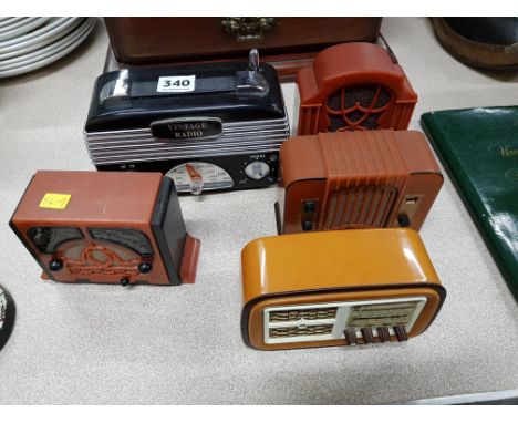 SHELF LOT OF SMALL RETRO STYLE RADIOS