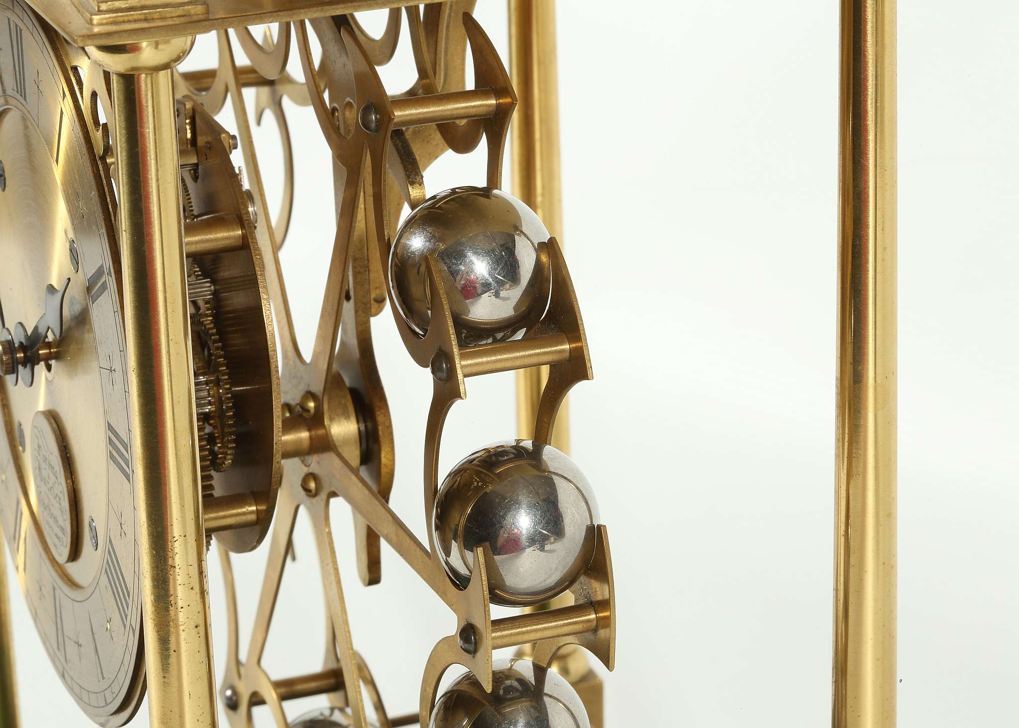 A 20TH CENTURY BRASS FALLING BALL CLOCK BY HARDING & BAZELEY