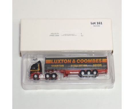 Manufacturer - Corgi | Description - Volvo FH Curtainside - Luxton &amp; Coombes | Stock Code - CC18008 | Model Condition - 5
