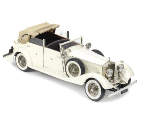 A 1:8 scale model of a 1934 Rolls-Royce Torpedo Cabriolet Phantom II, by Pocher,constructed model kit from plastic and metal 