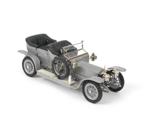 A 1:12 scale model of the 1907 'AX 201' Rolls-Royce Silver Ghost, by Franklin Mint,finely detailed die-cast model from the Co