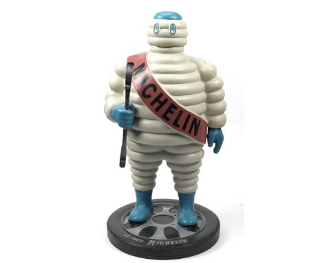 A hand-painted 'Mr Bibendum' standing forecourt display figure,modern, fibreglass construction, depicting the Michelin advert