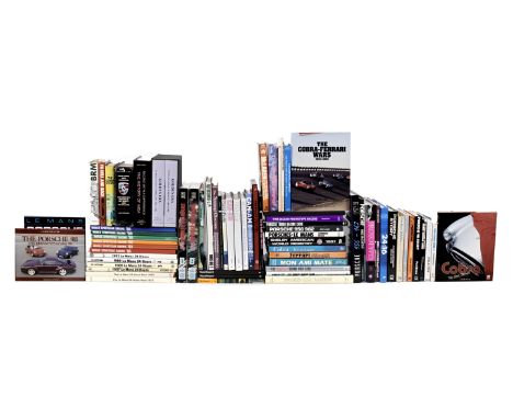 A quantity of books relating to Porsche, Le Mans, Shelby Cobra, and other sports racing and motorsport subjects,including J.A