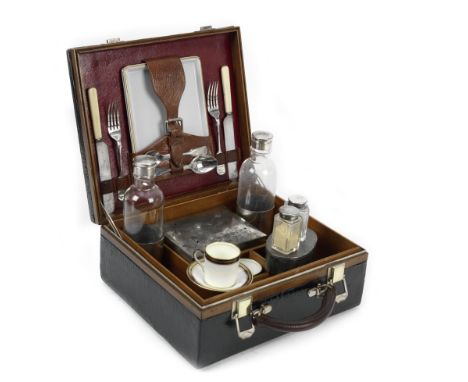 A cased drinks/picnic set for two persons by Drew &amp; Sons, circa 1905,black pigskin case with brown leather handle, brass 