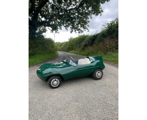 A Watsonian Cheetah Cub Child's 'D-Type Jaguar' racing car, 1960sfinished in British Racing Green, original Villiers 4 stroke