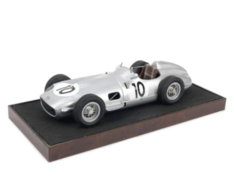 A 1:8 scale model of Juan Manuel Fangio's 1955 British Grand Prix Mercedes-Benz W196 by Javan Smith,hand-built kerbside model